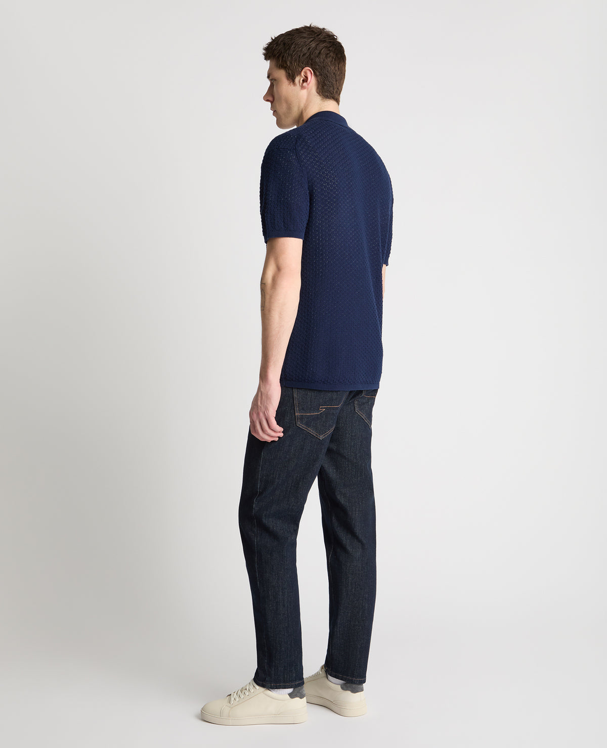 Man wearing a blue jumper