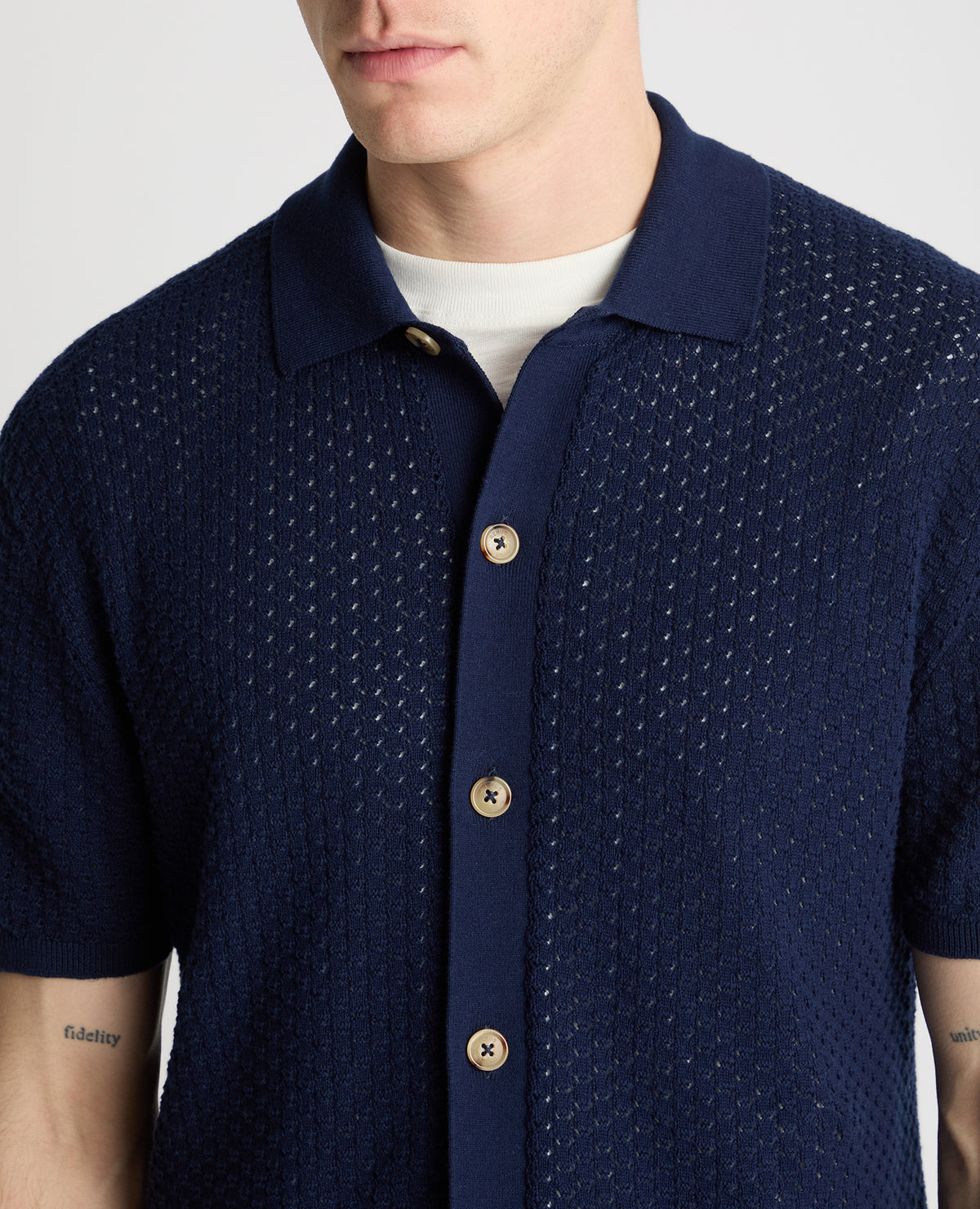 Man wearing a blue jumper