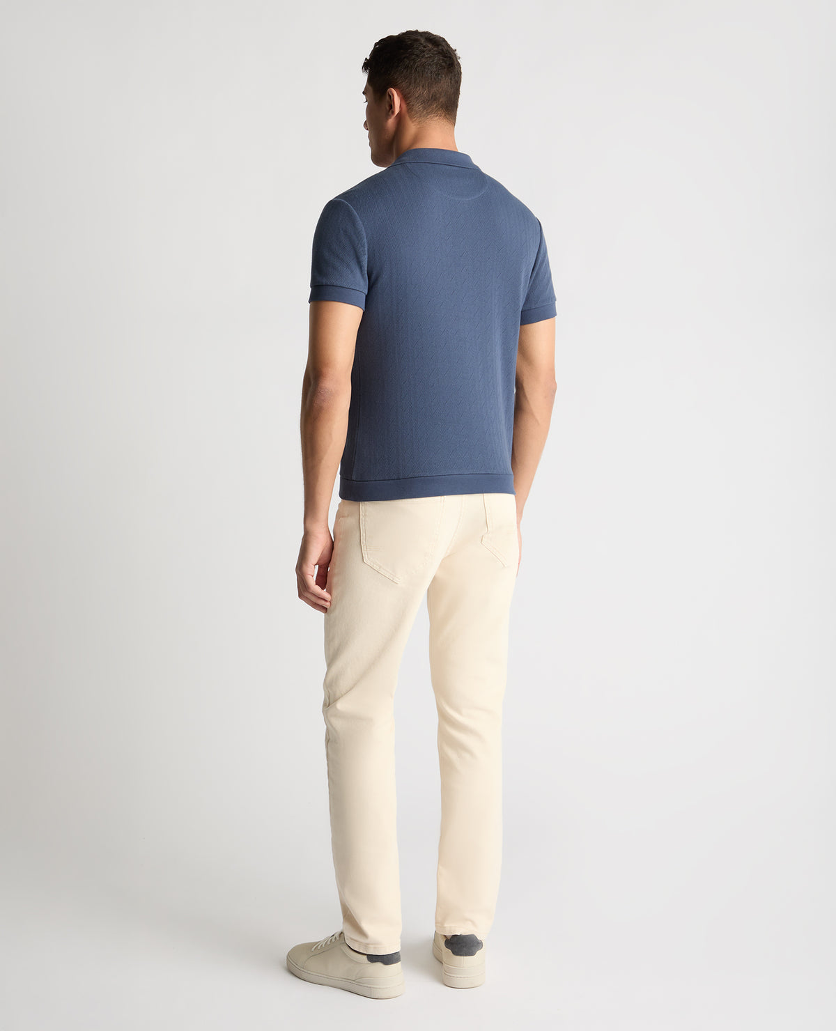 Man wearing a blue jumper