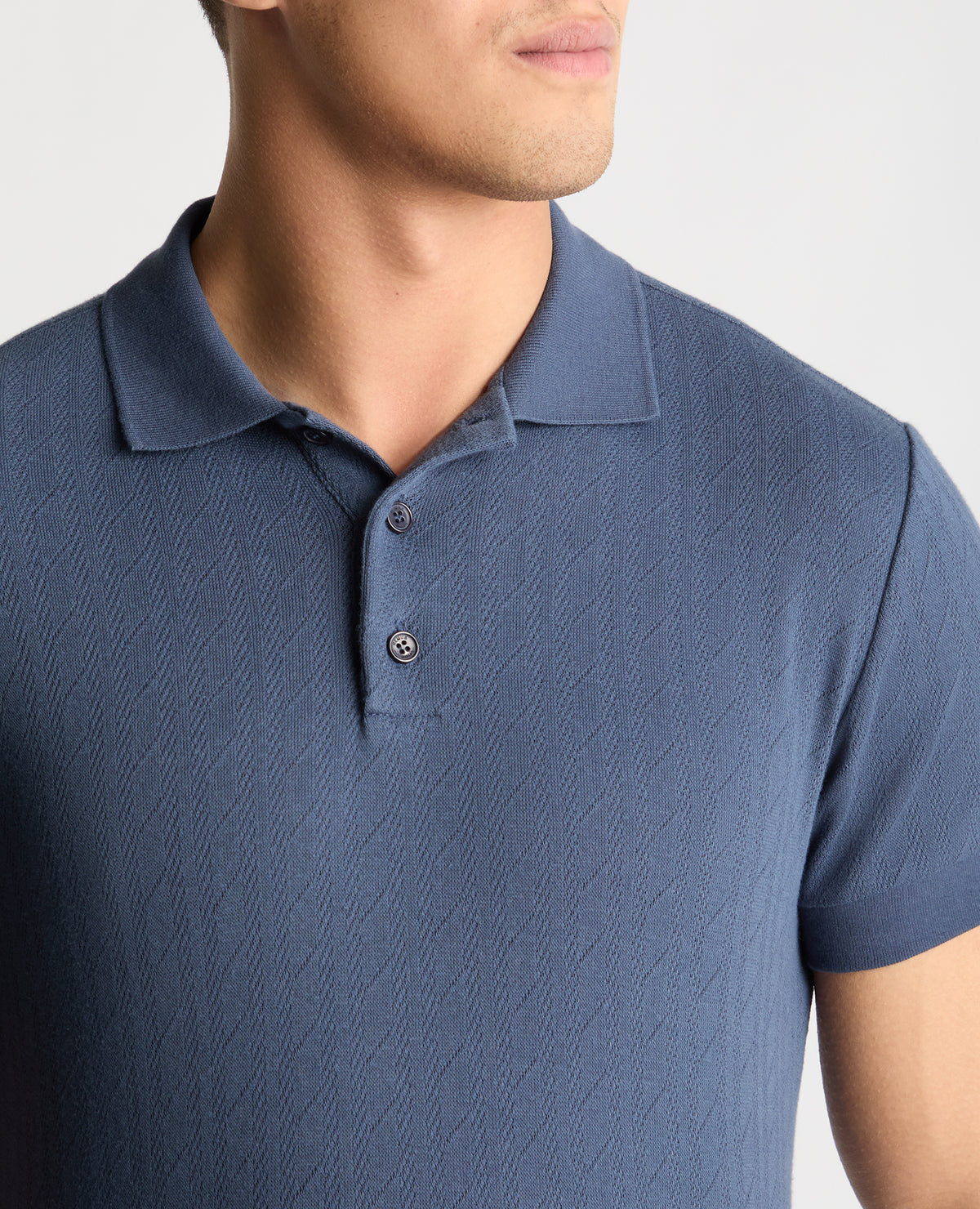 Man wearing a blue jumper