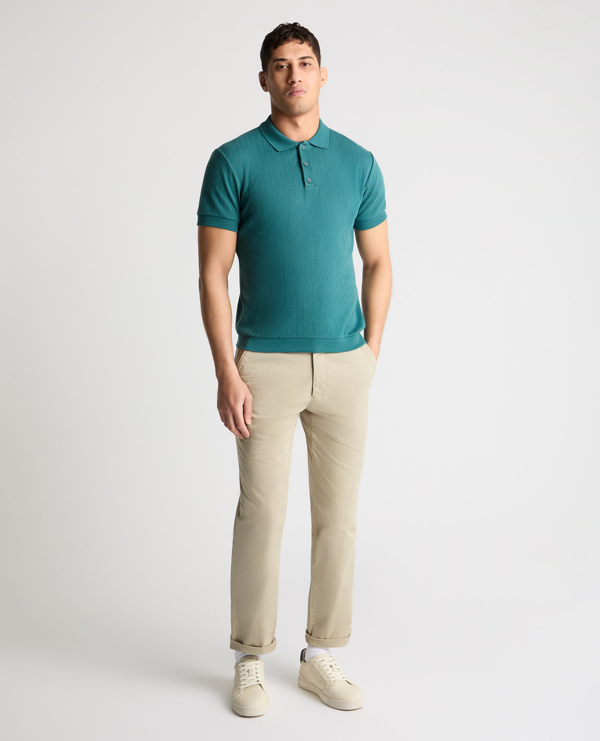 Man wearing a green jumper