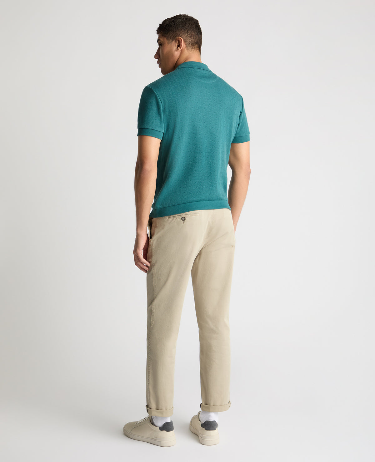 Man wearing a green jumper