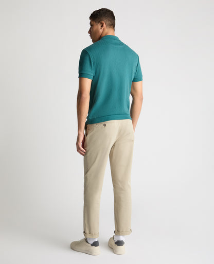 Man wearing a green jumper