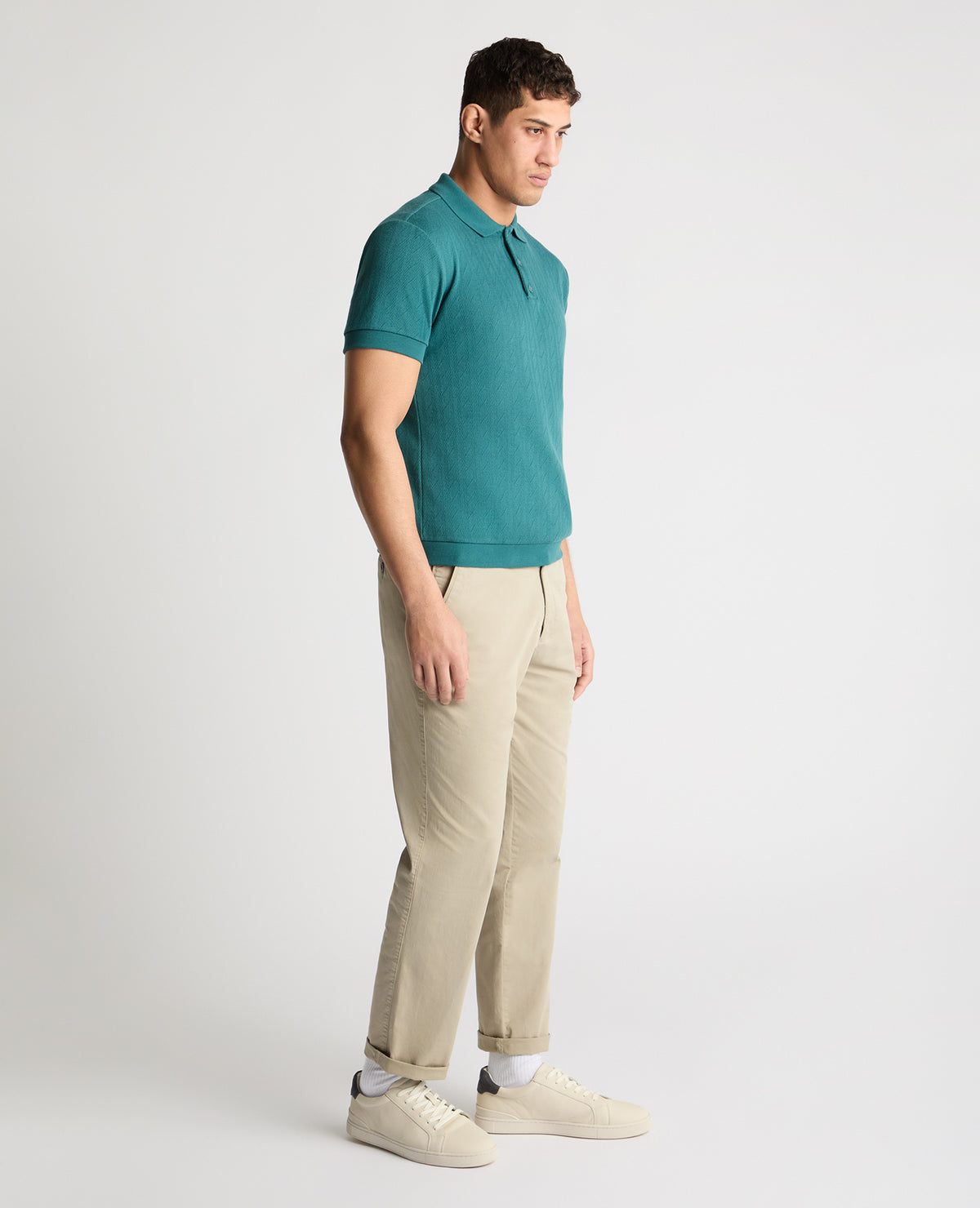 Man wearing a green jumper