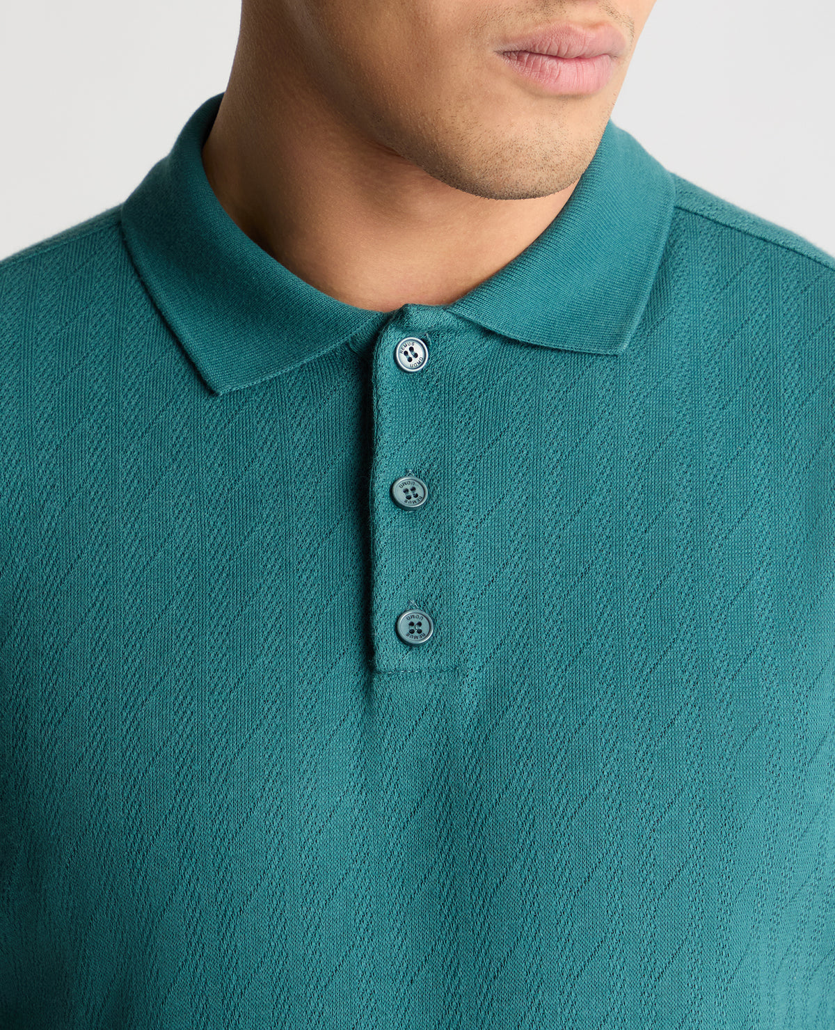 Man wearing a green jumper