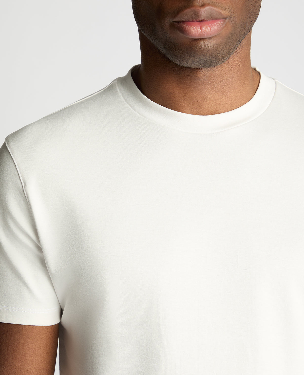 Man wearing a White jumper