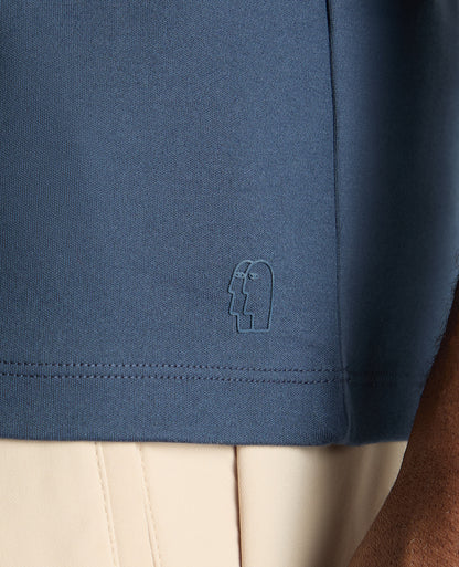 Man wearing a blue jumper