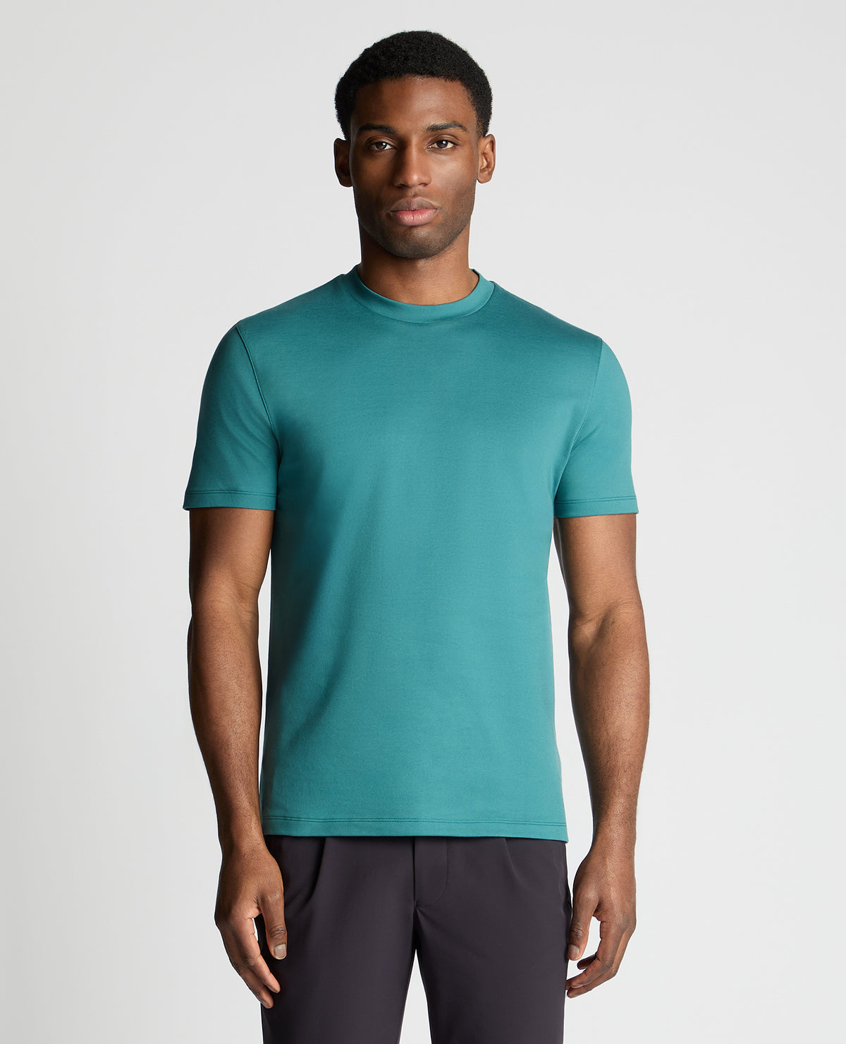 Man wearing a green jumper
