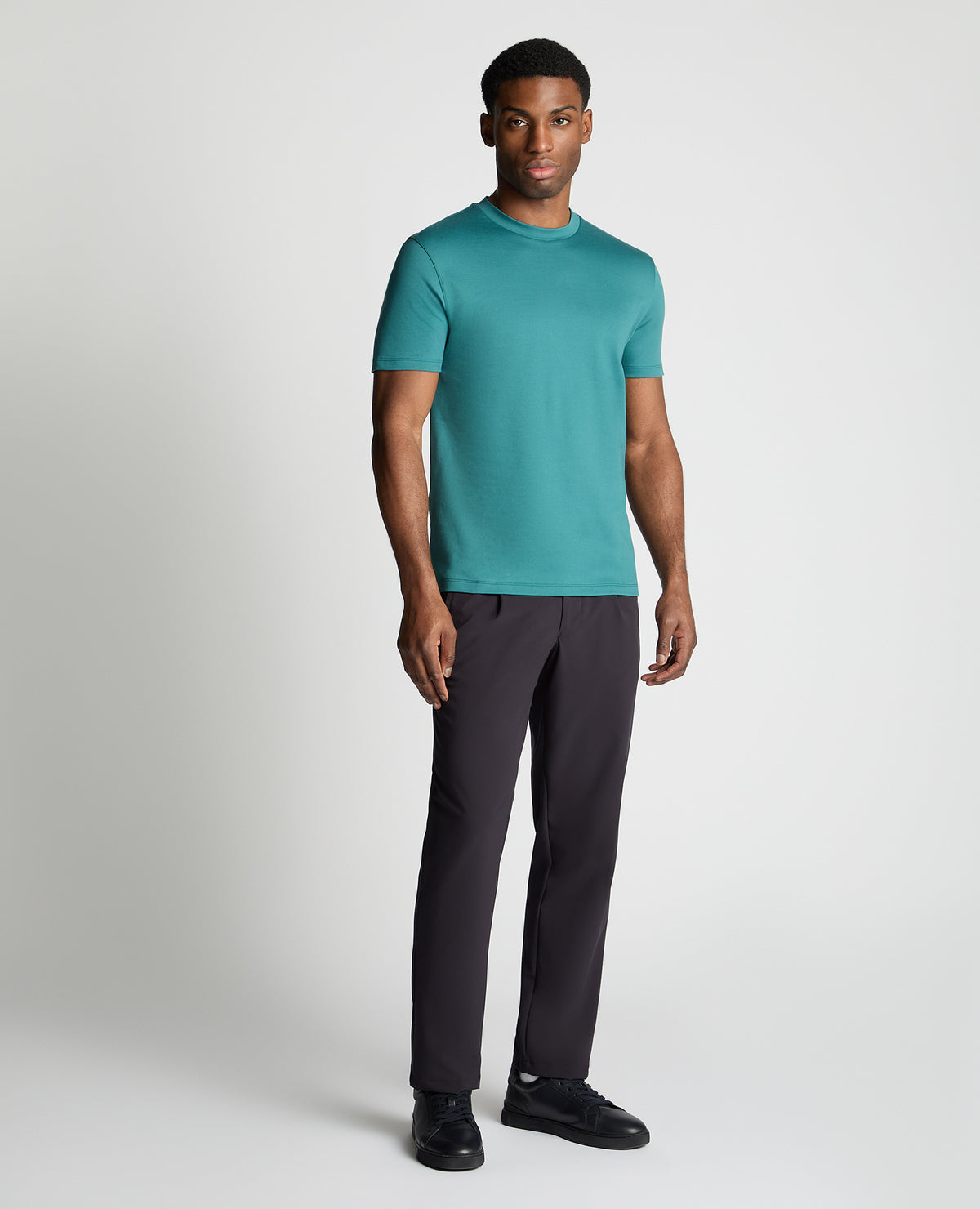 Man wearing a green jumper