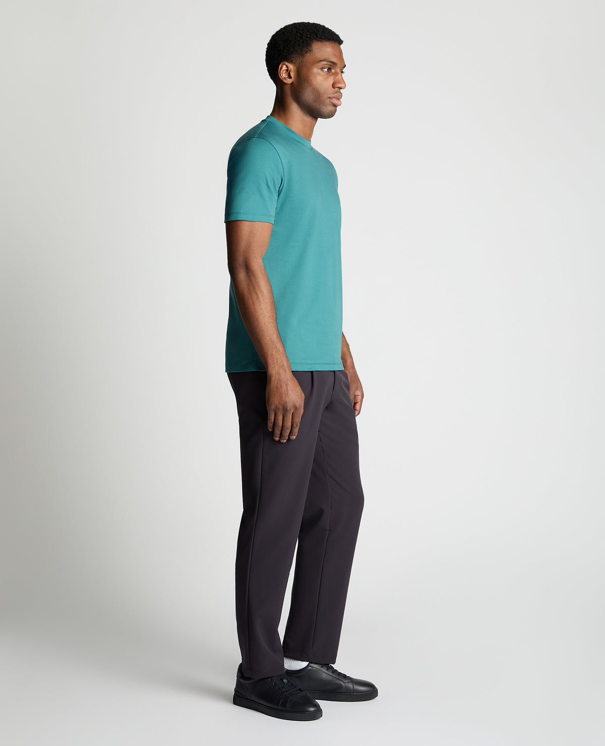 Man wearing a green jumper