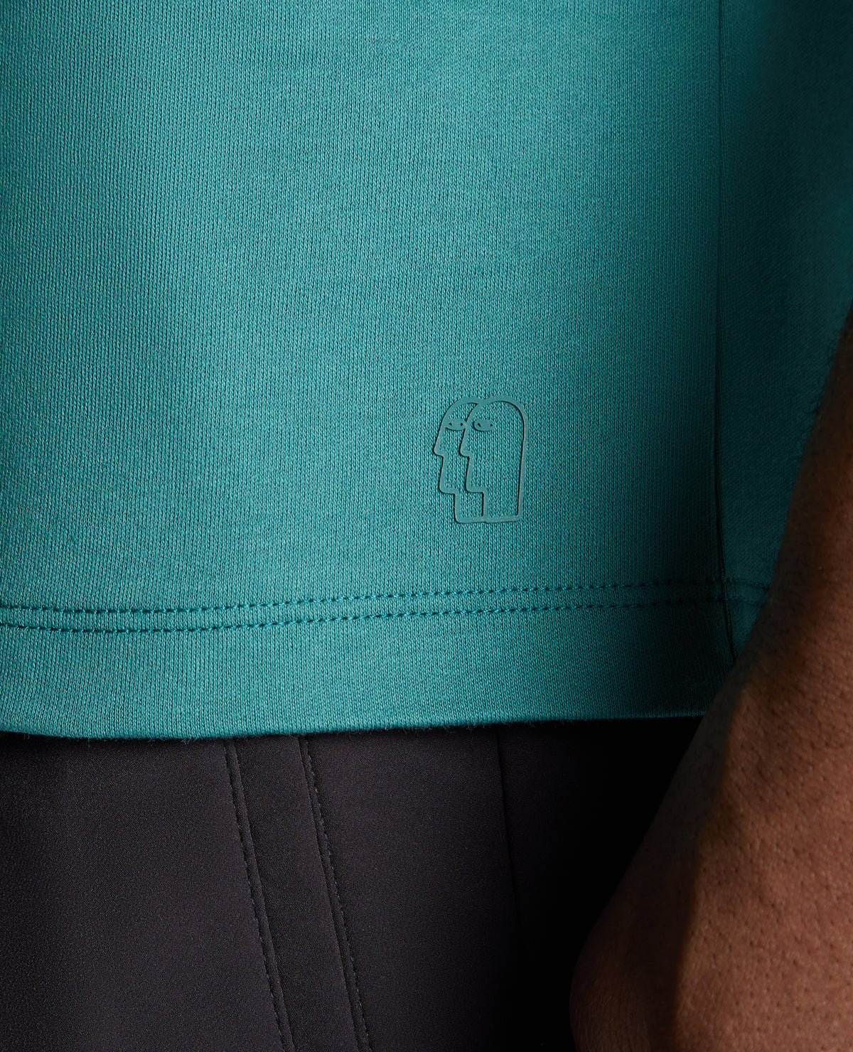 Man wearing a green jumper