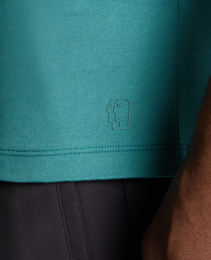 Man wearing a green jumper
