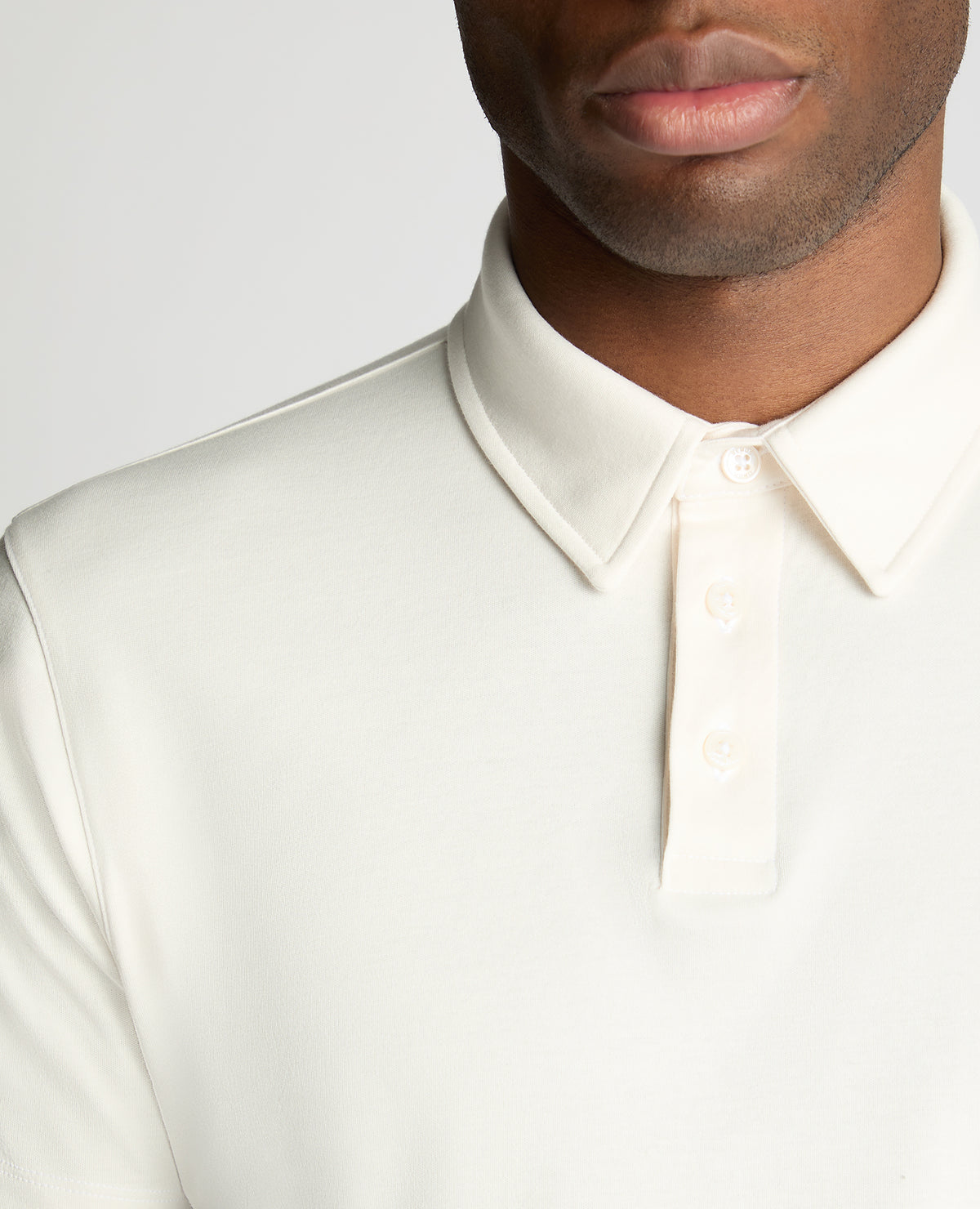 Man wearing a White jumper
