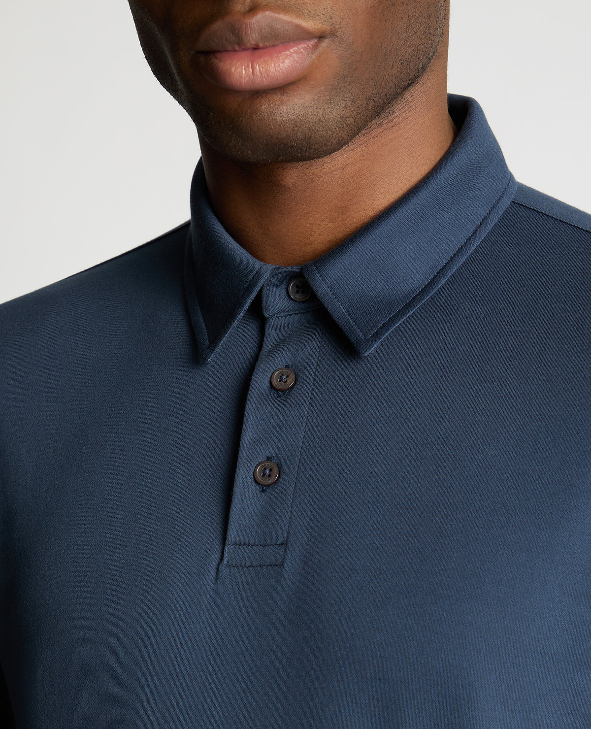Man wearing a blue jumper
