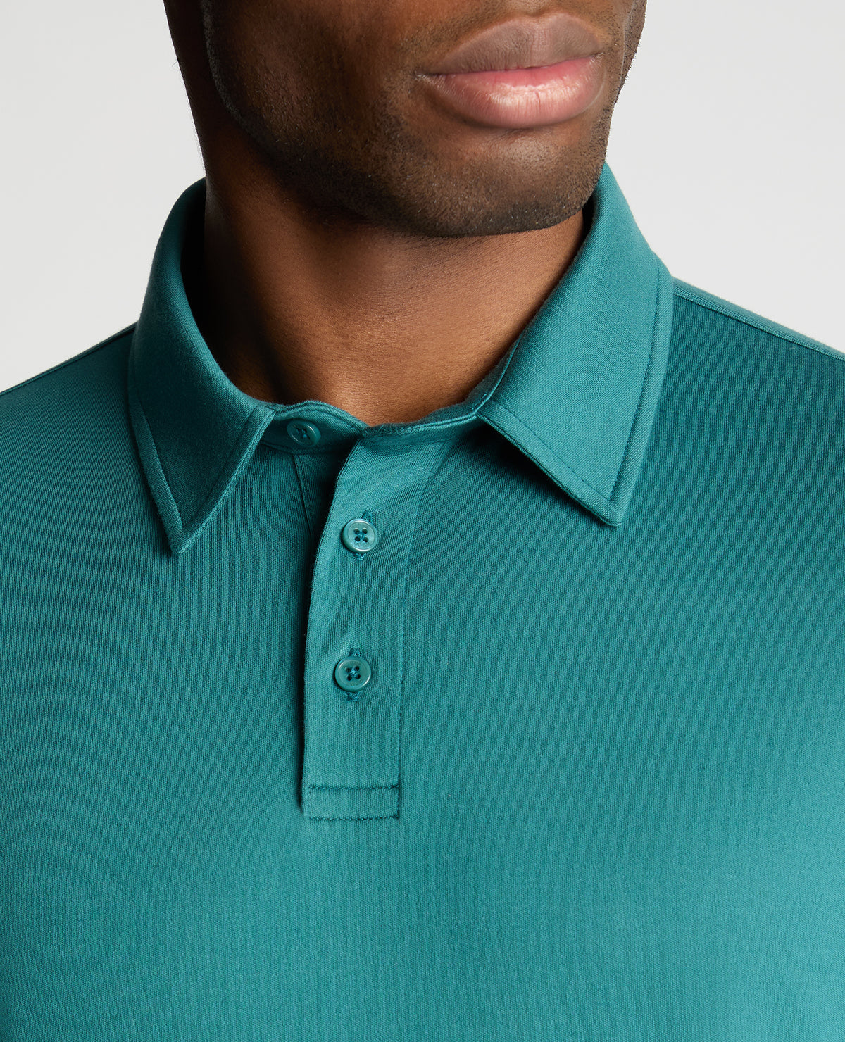 Man wearing a green jumper