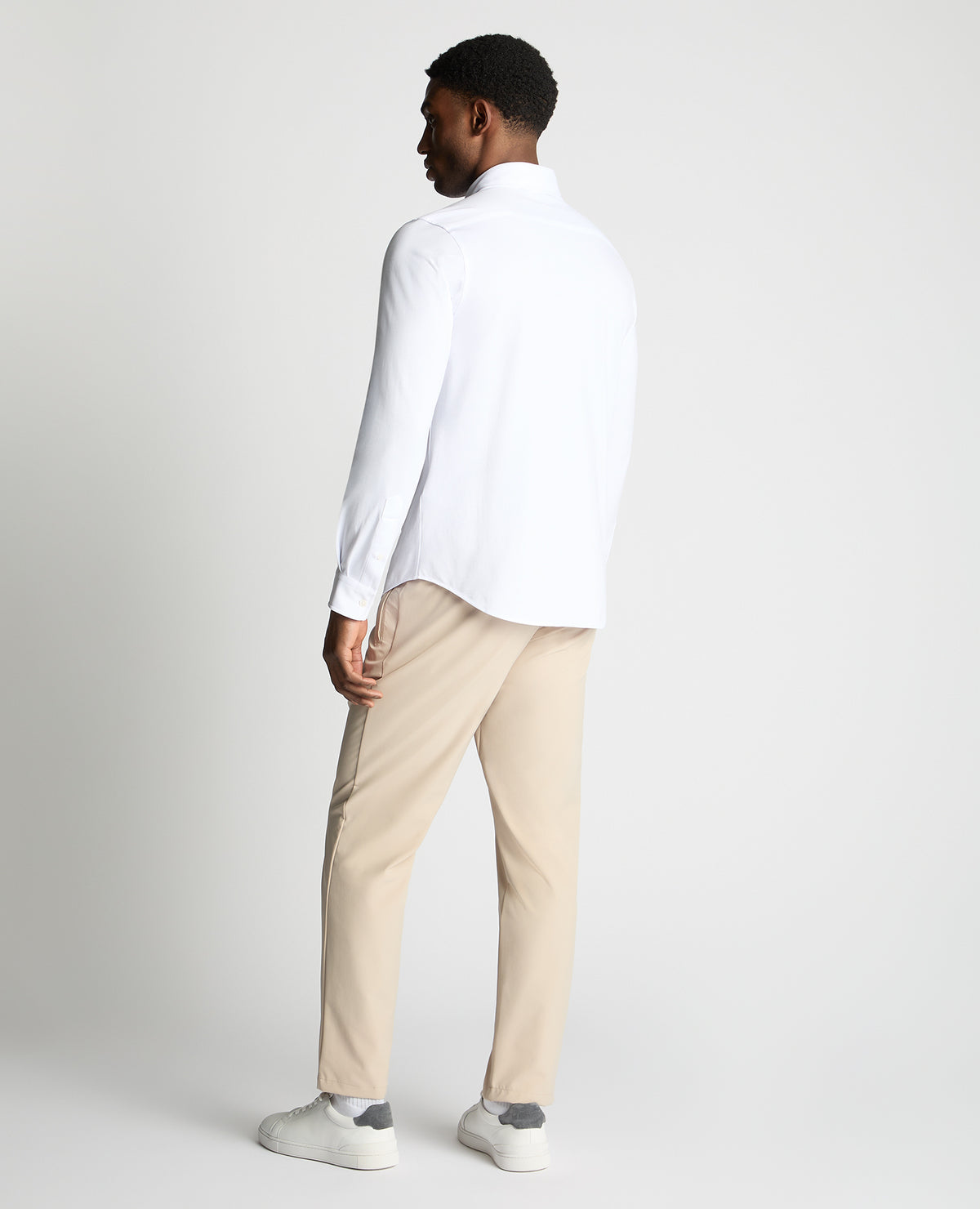 Man wearing a White jumper
