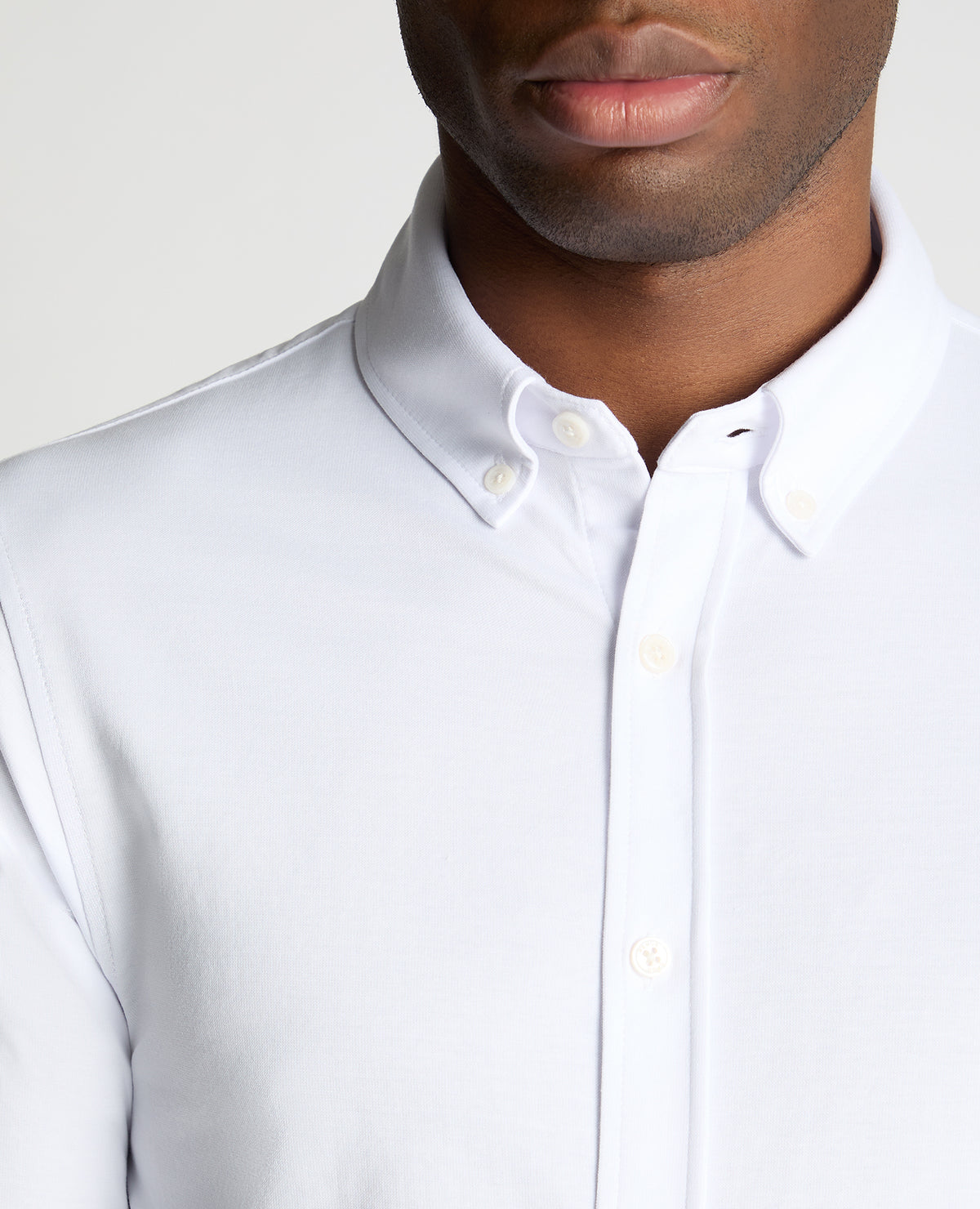Man wearing a White jumper