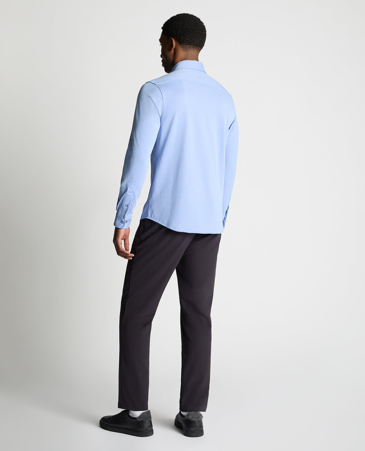 Man wearing a blue jumper