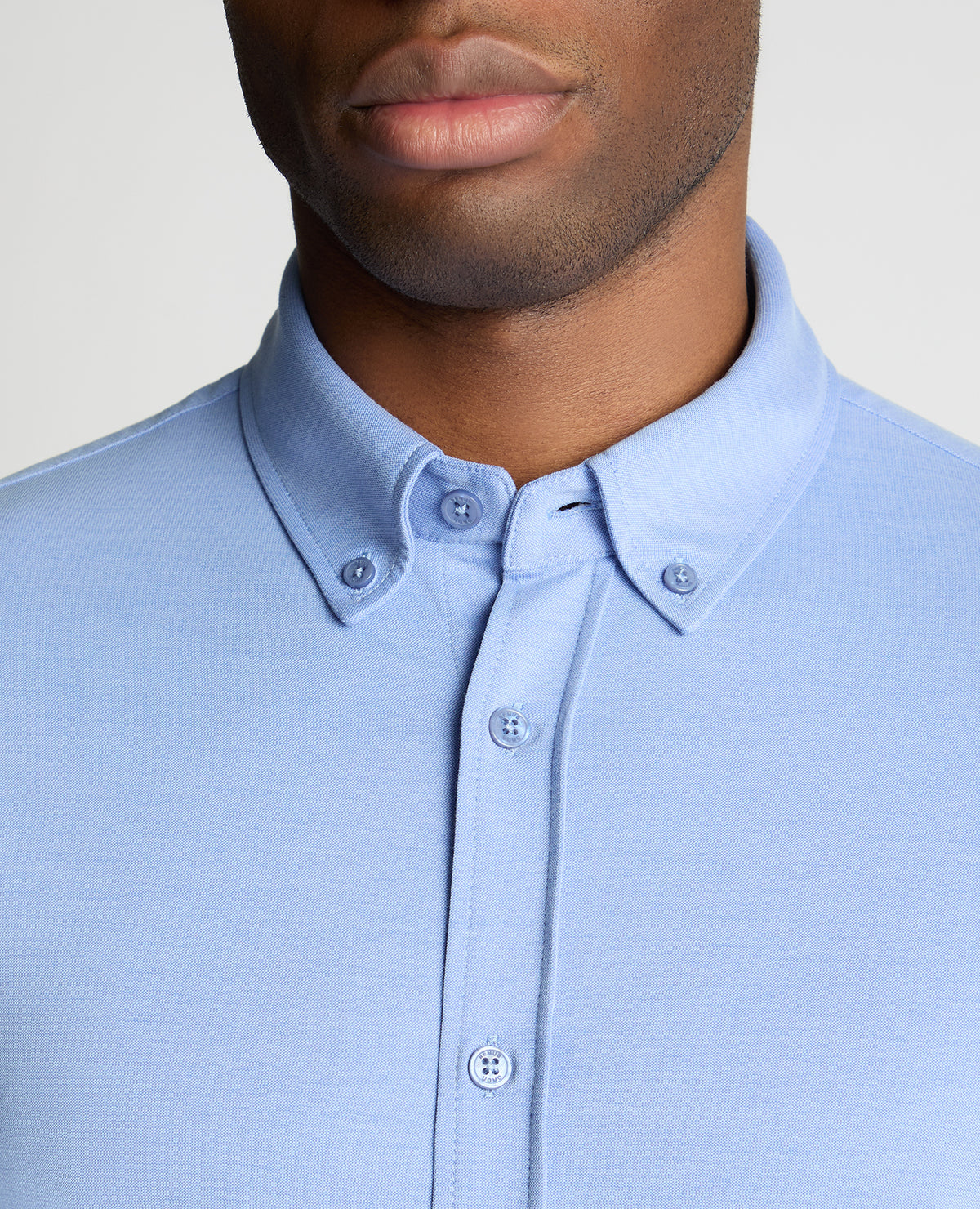 Man wearing a blue jumper