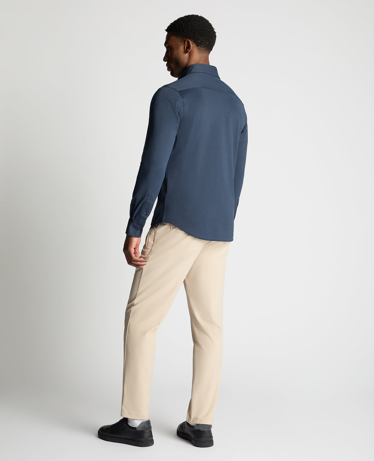 Man wearing a navy jumper