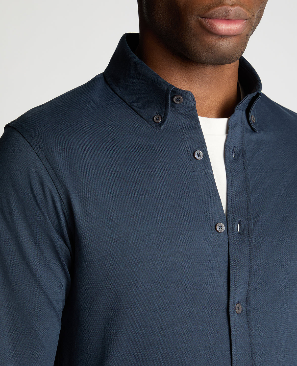 Man wearing a navy jumper