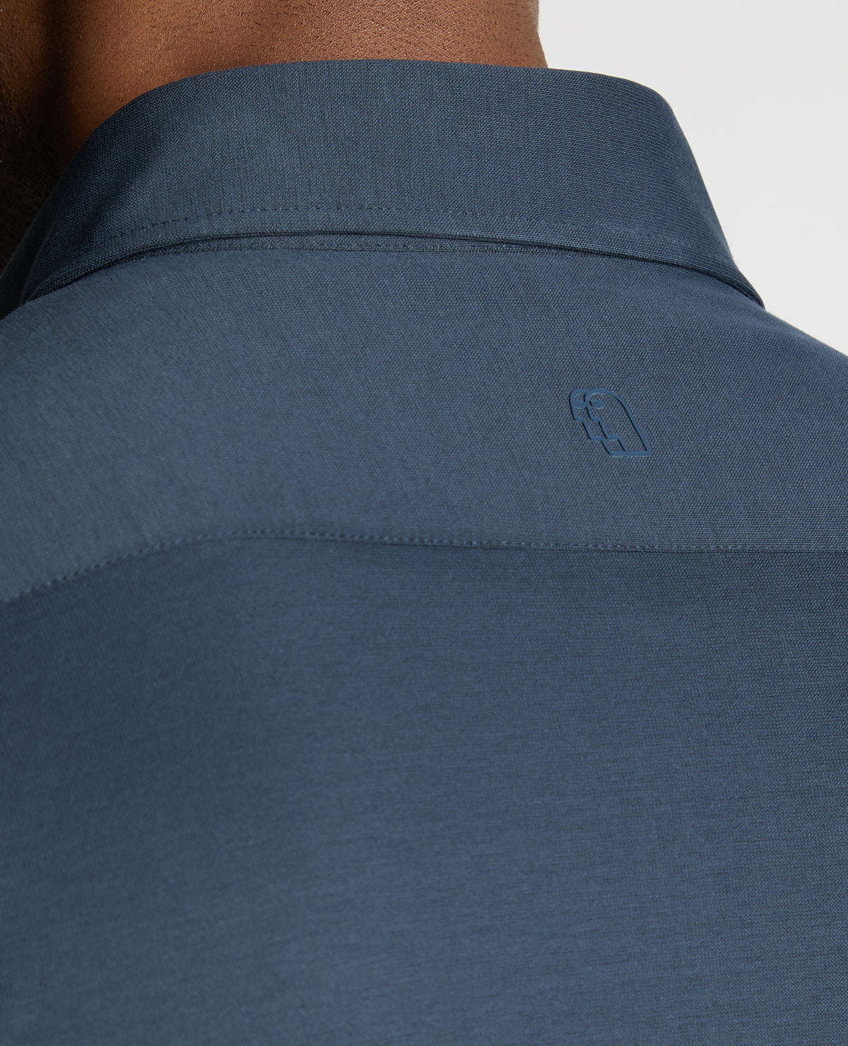 Man wearing a navy jumper