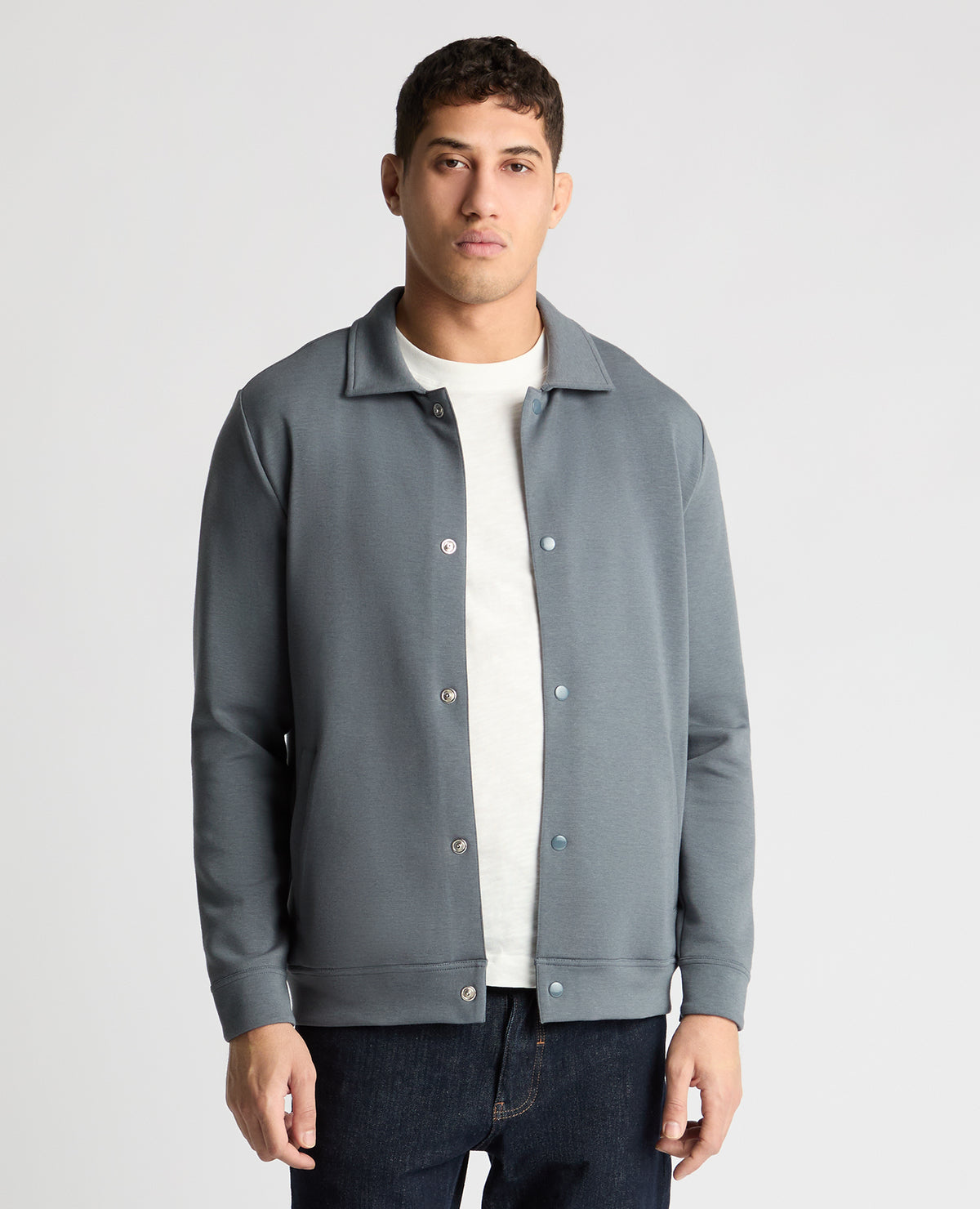 Man wearing a Grey jumper