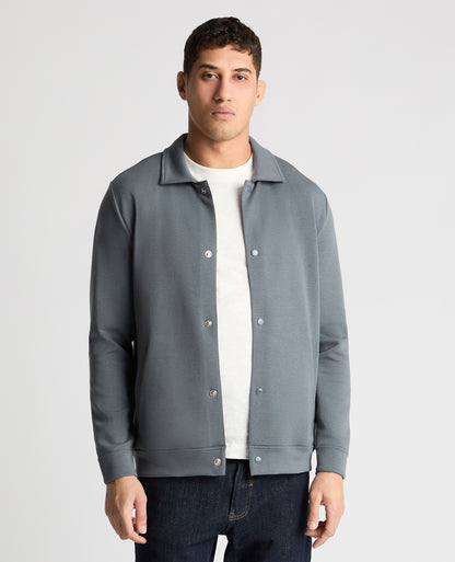 Man wearing a Grey jumper