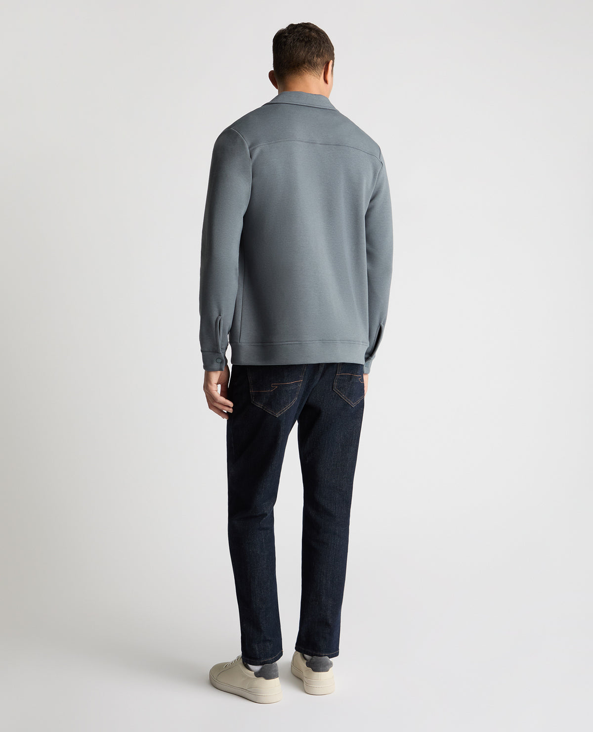 Man wearing a Grey jumper