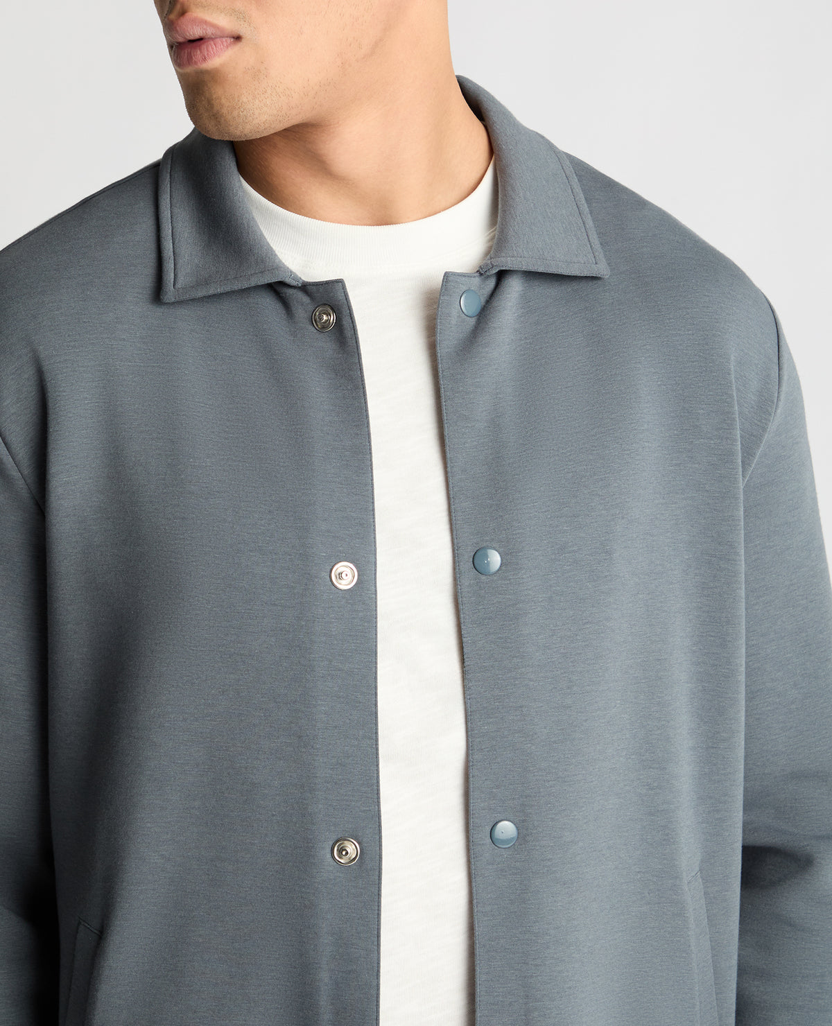 Man wearing a Grey jumper