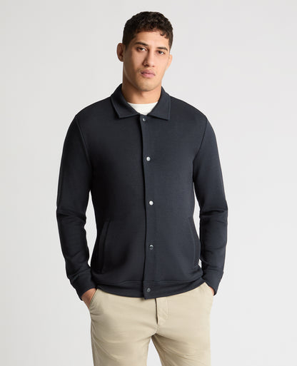 Man wearing a navy jumper