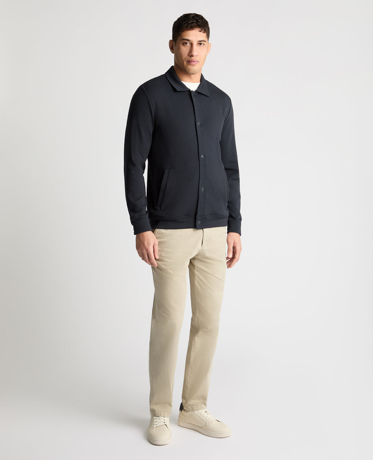 Man wearing a navy jumper