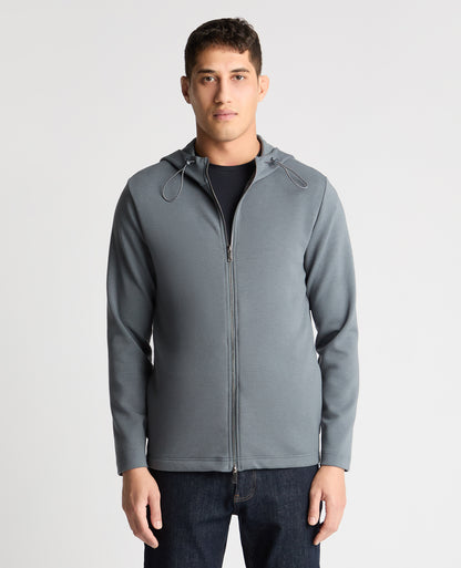 Man wearing a Grey jumper