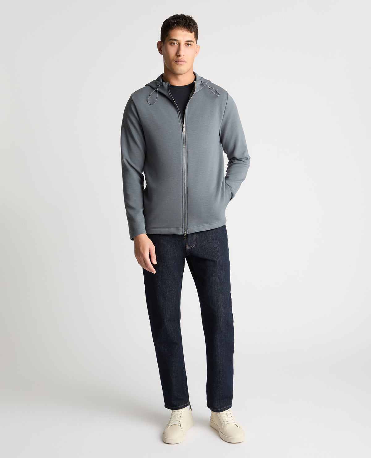 Man wearing a Grey jumper