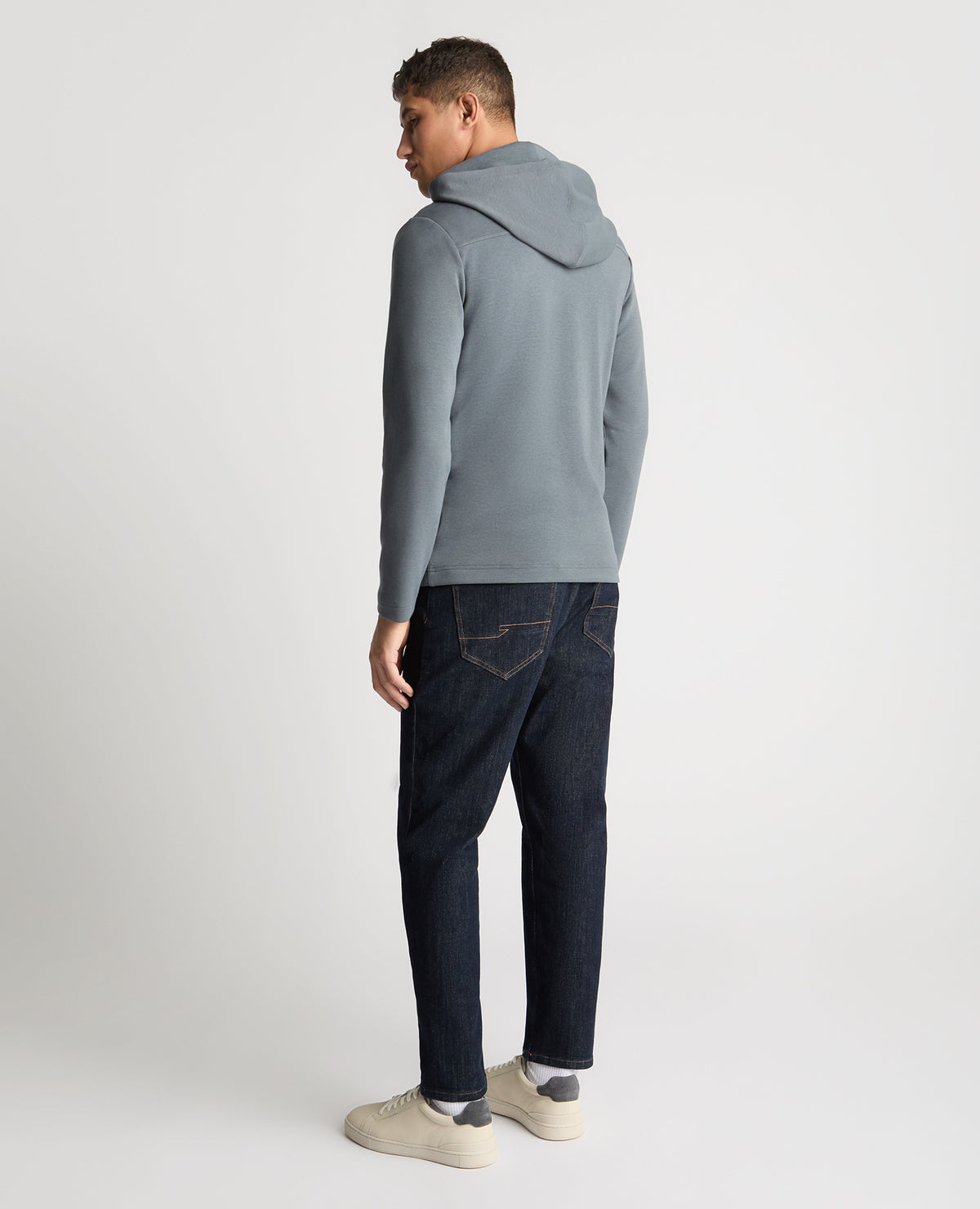 Man wearing a Grey jumper