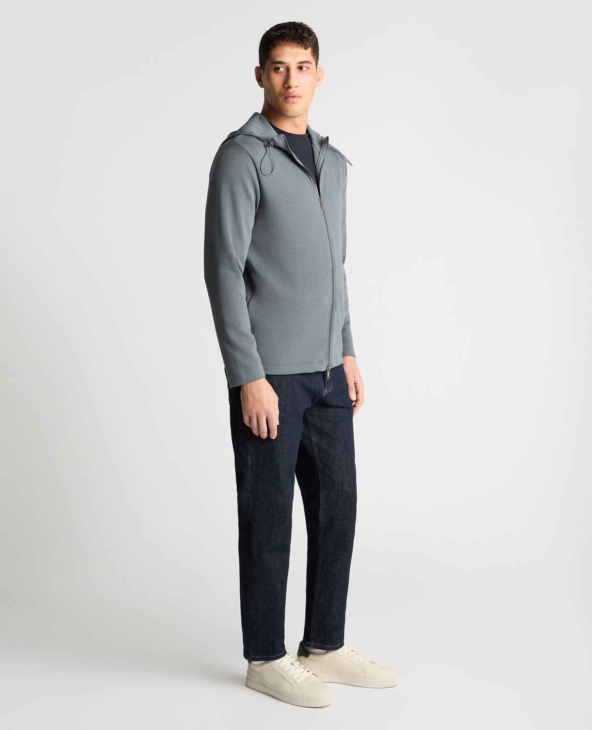 Man wearing a Grey jumper