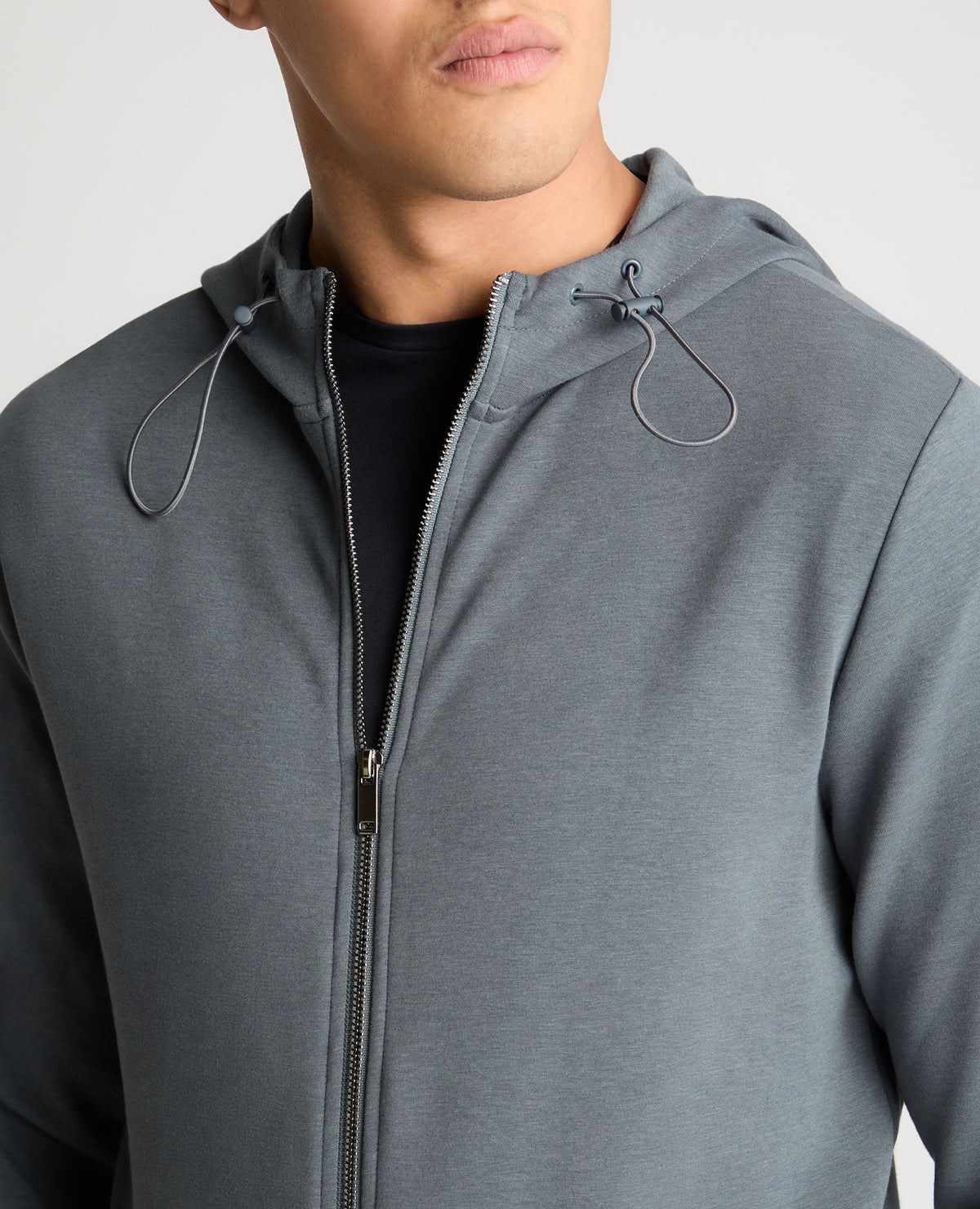 Man wearing a Grey jumper
