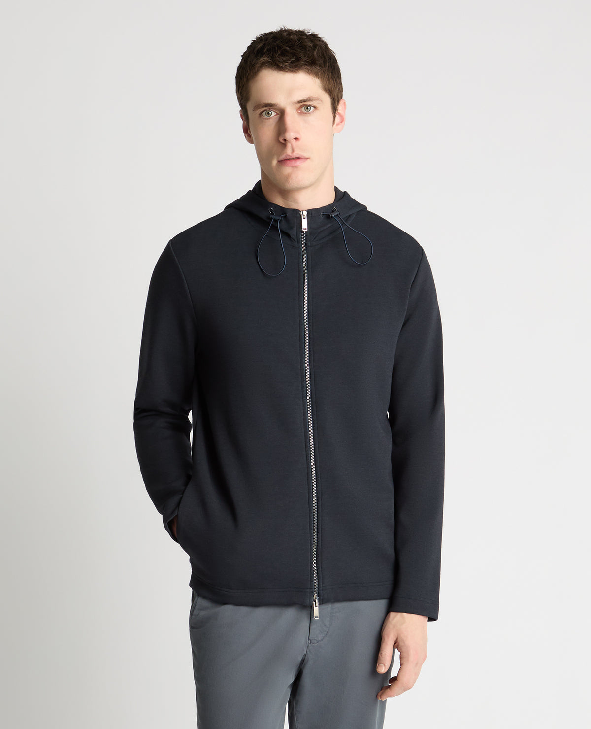 Man wearing a navy jumper