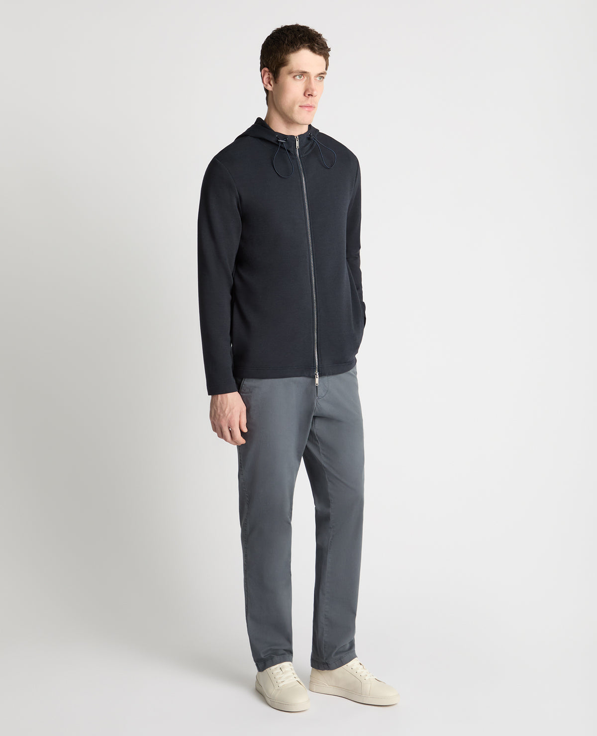 Man wearing a navy jumper