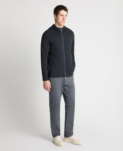 Man wearing a navy jumper