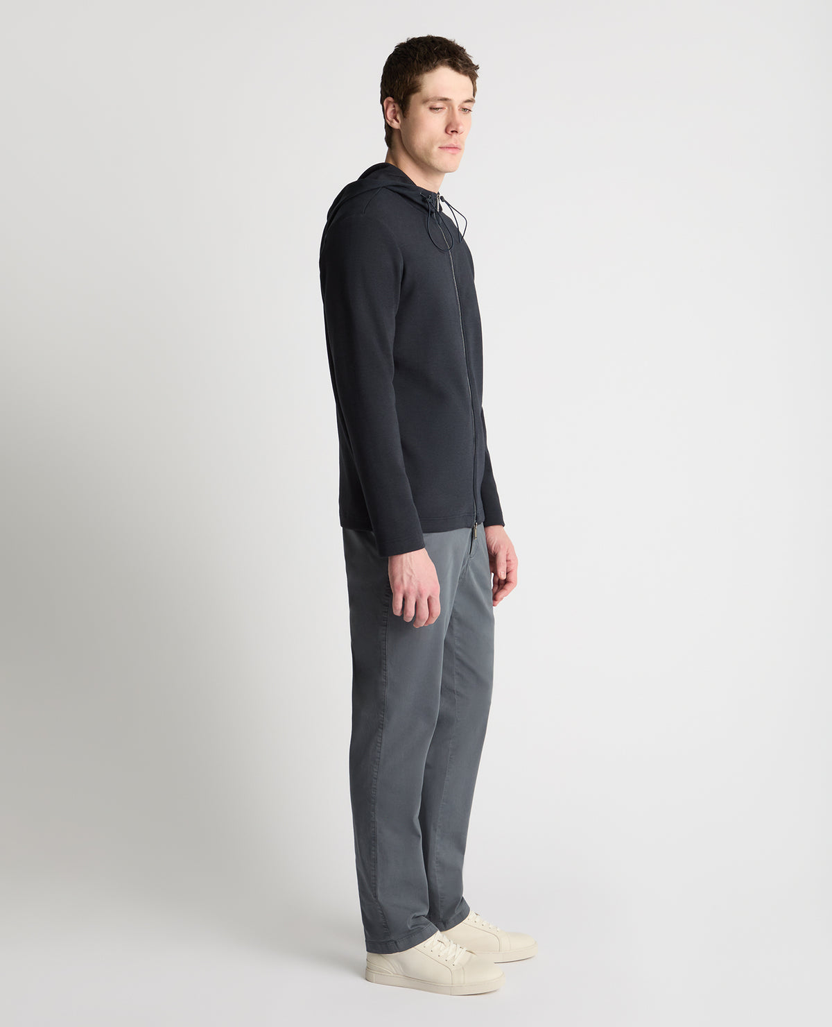 Man wearing a navy jumper