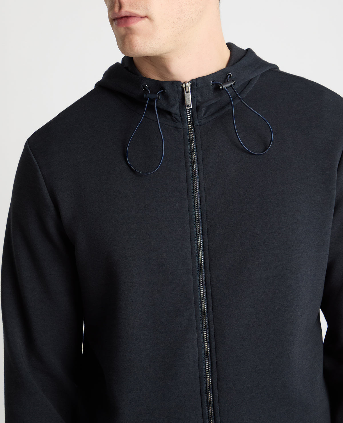 Man wearing a navy jumper