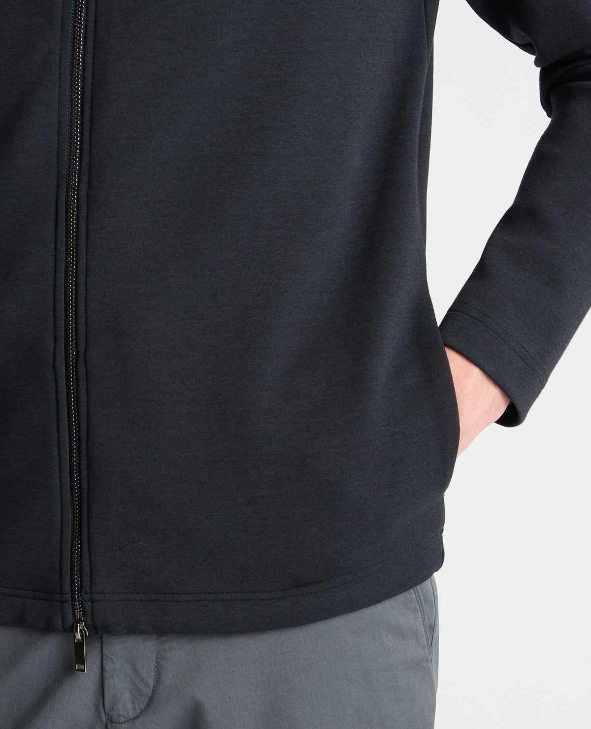 Man wearing a navy jumper