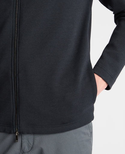 Man wearing a navy jumper