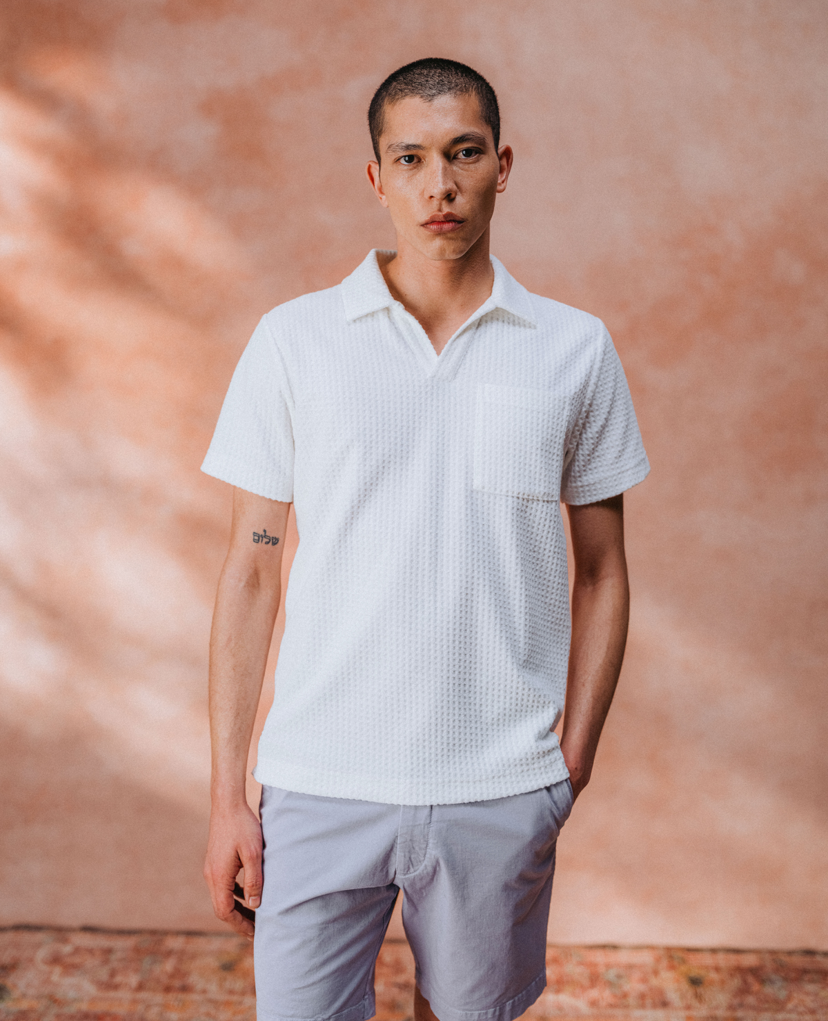 Man wearing a White jumper