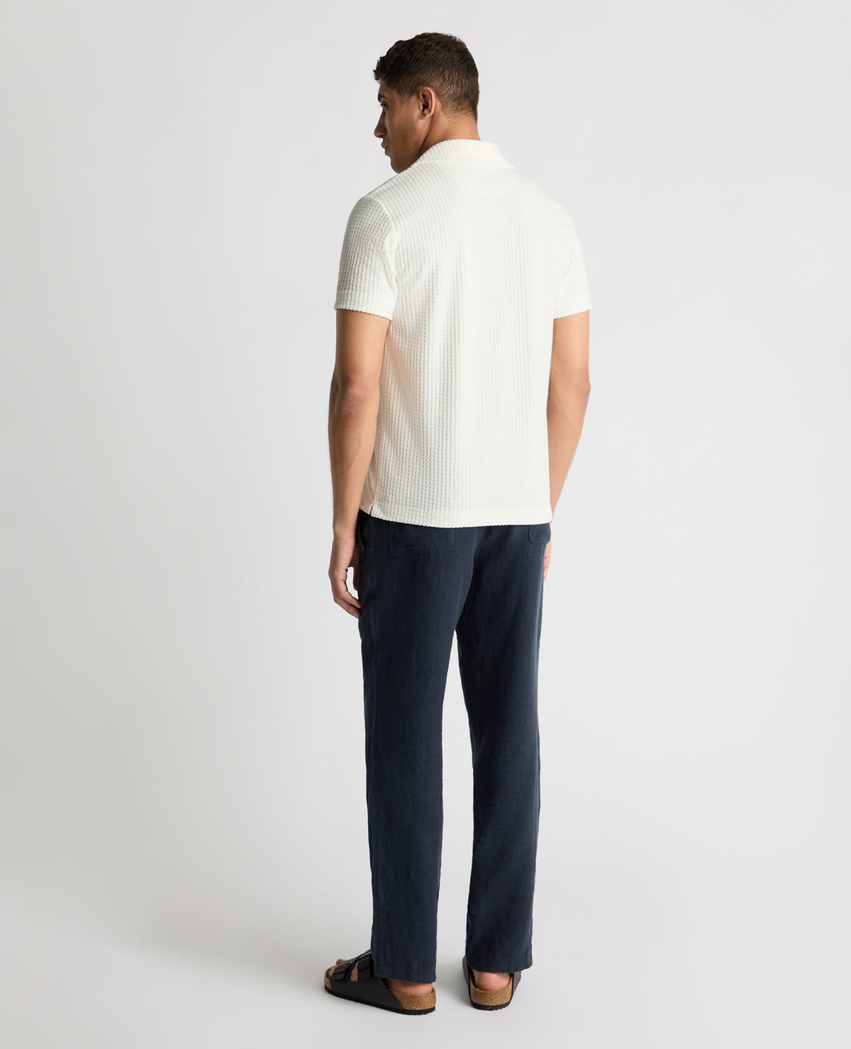 Man wearing a White jumper
