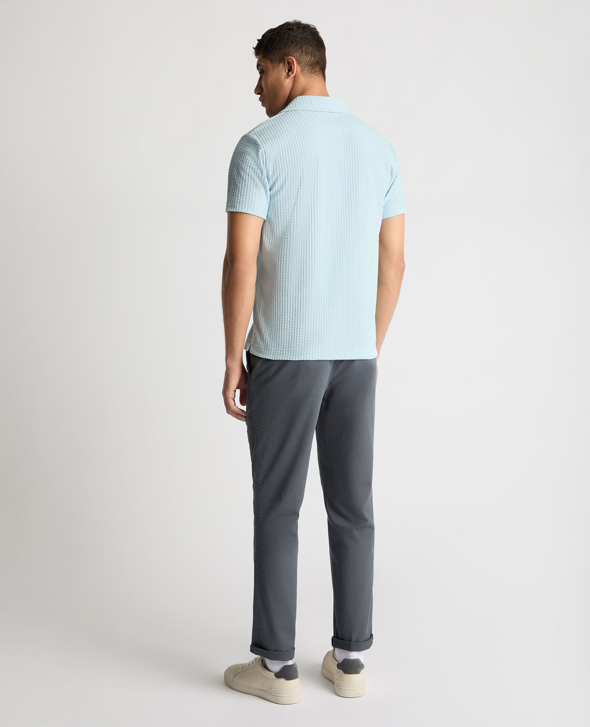 Man wearing a blue jumper