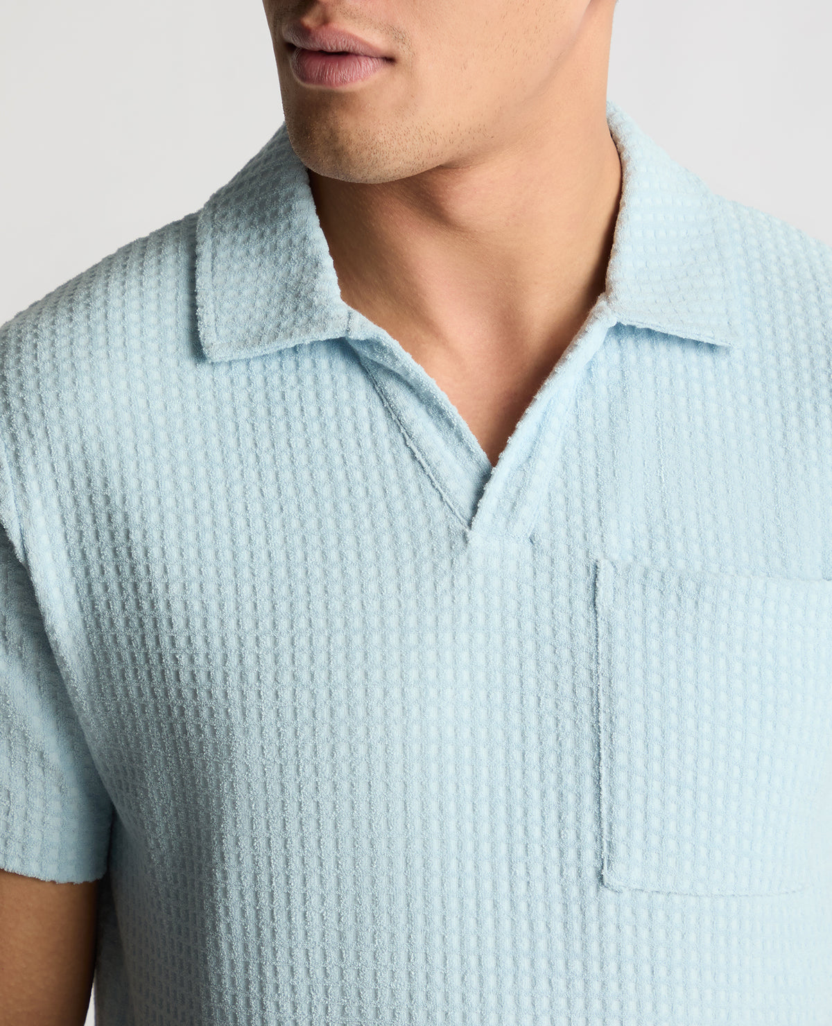 Man wearing a blue jumper