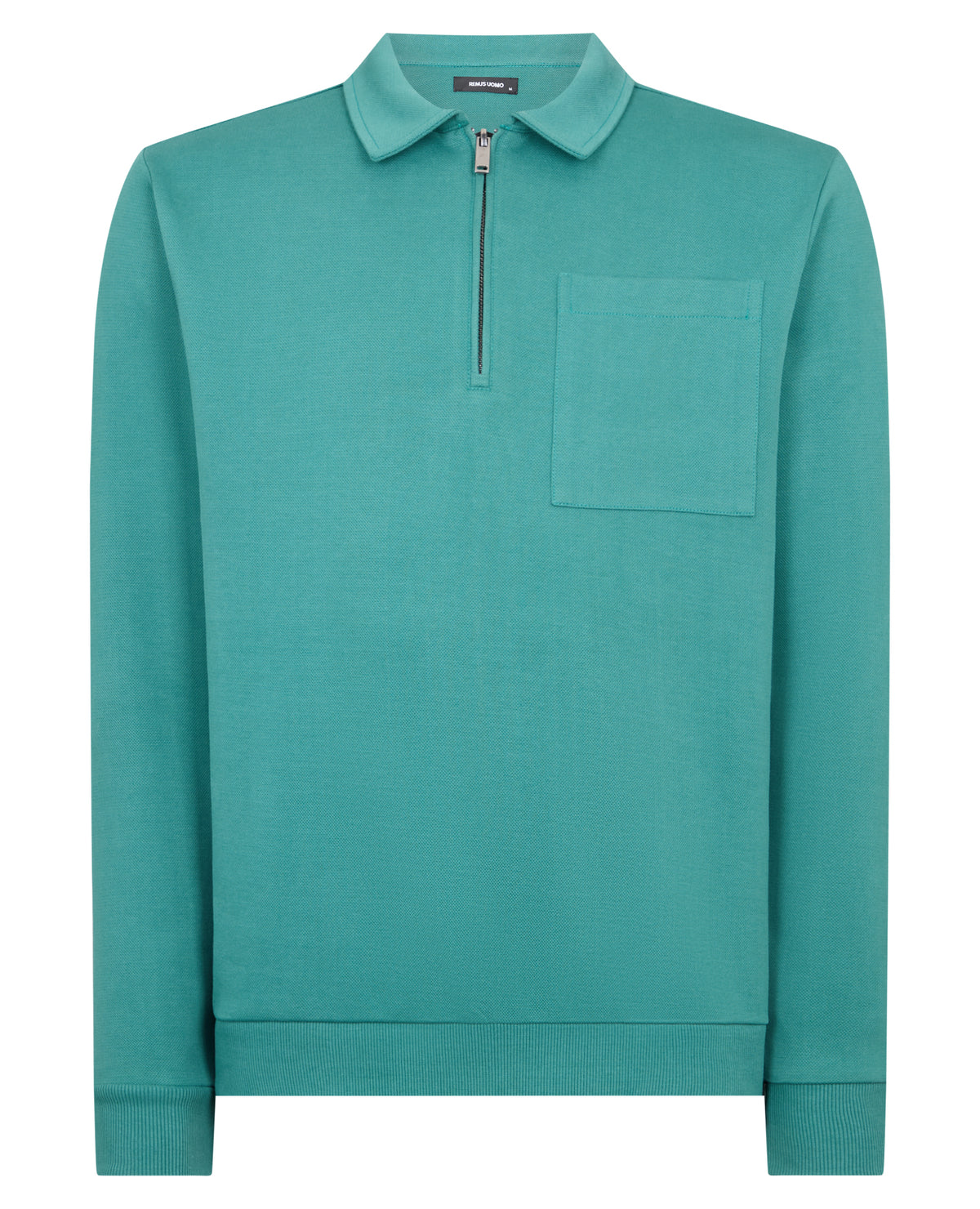 Man wearing a green jumper