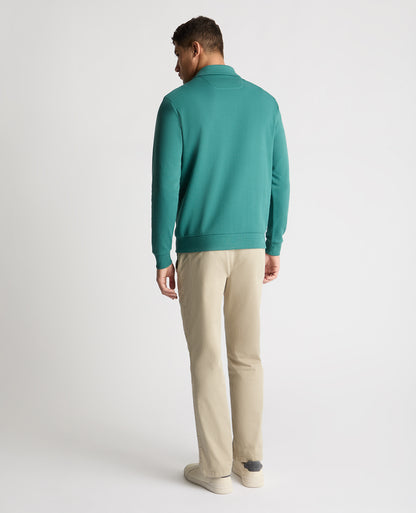 Man wearing a green jumper